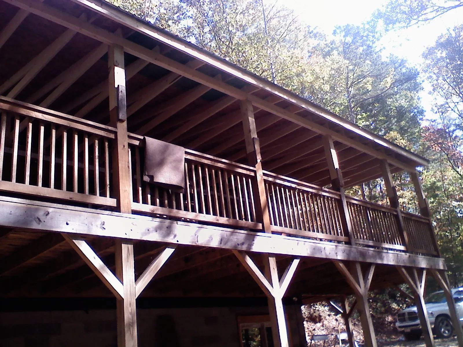 Timber framing under a new elevated porch and deck — Roof Leak Repair in Castleton by Roofing Brothers